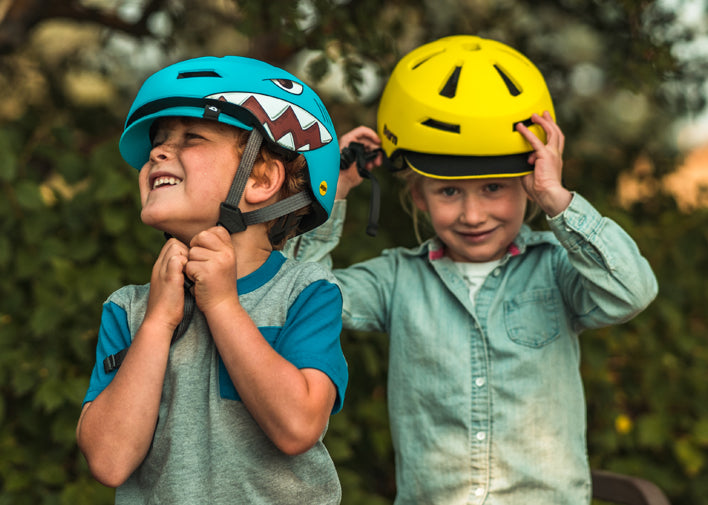 Children wearing stylish bike helmets. Bern's Nino 2.0