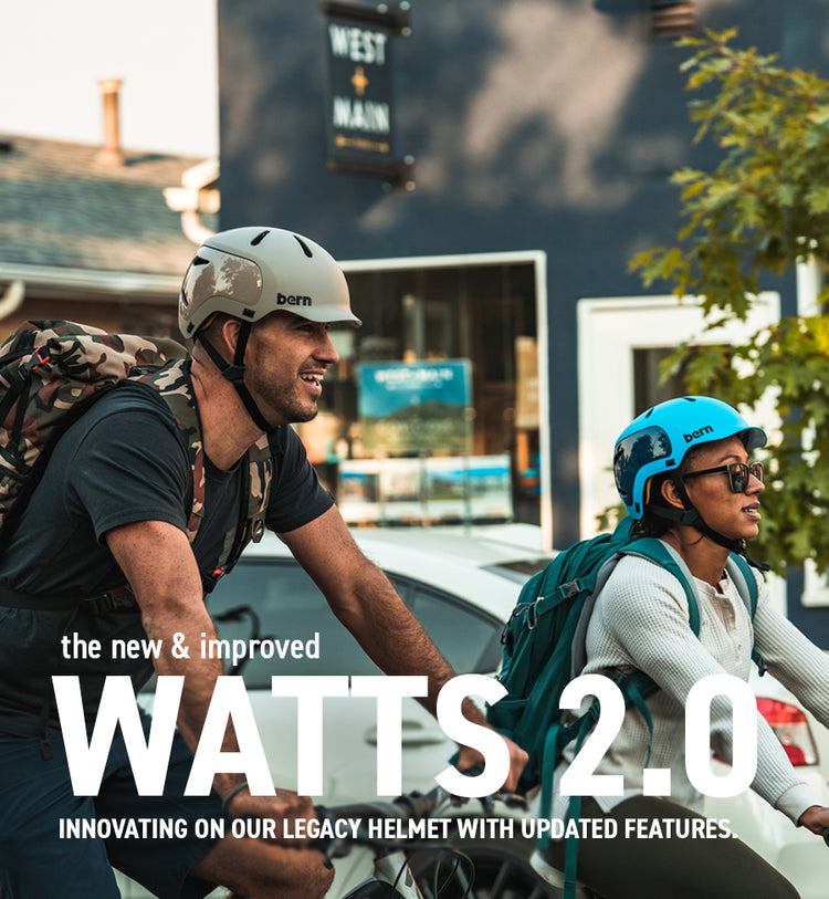 Man and women wearing Bern's Watts 2.0 Bike Helmet - Bern's newest adult bike helmet.